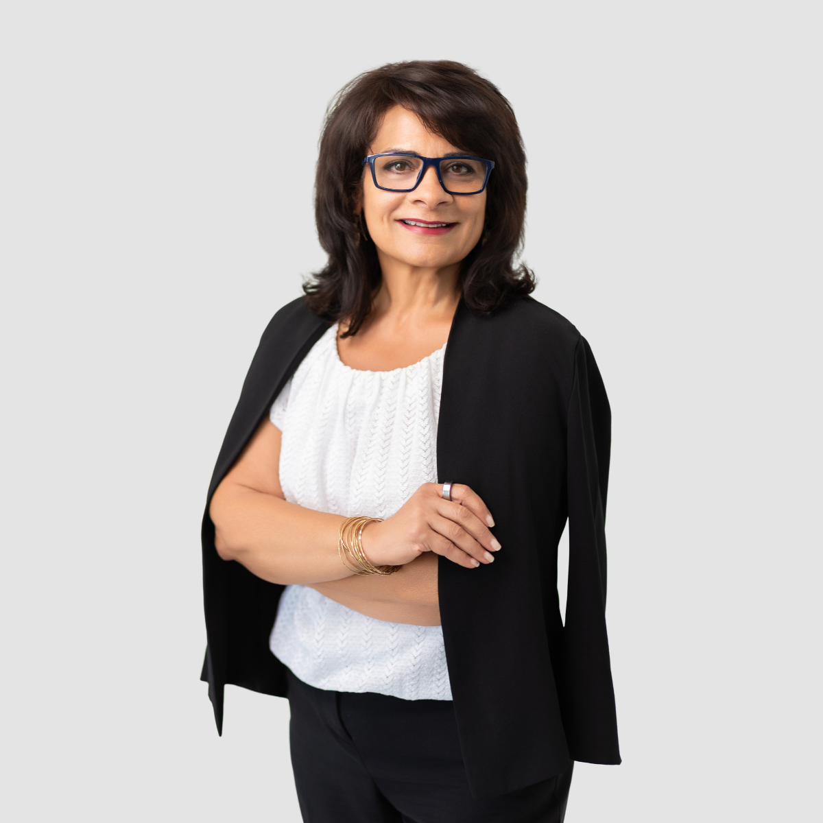 Dr. Helen Fagan with arms crossed and smiling